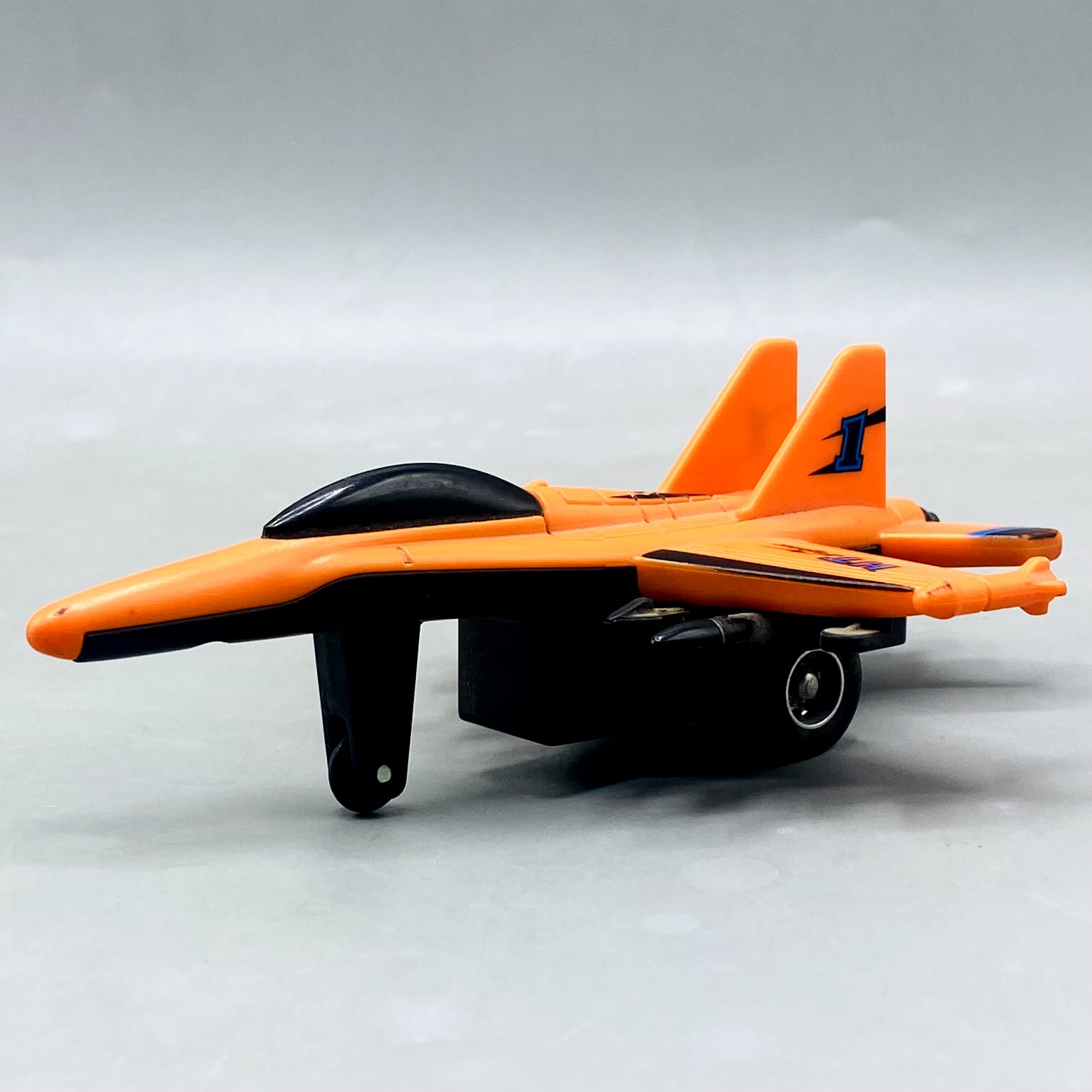 Orange "HT Fighter" Die-Cast/Plastic Jet with Missile Details