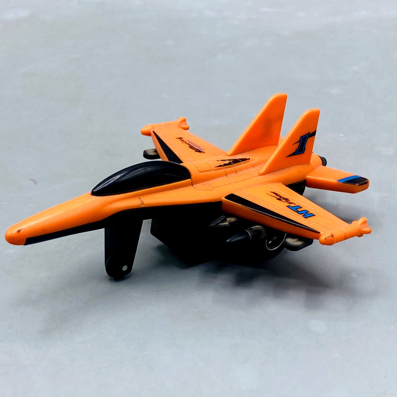 Orange "HT Fighter" Die-Cast/Plastic Jet with Missile Details